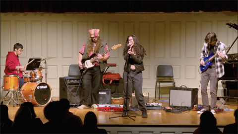 Students perform on stage at the MIND Empowerment Showcase
